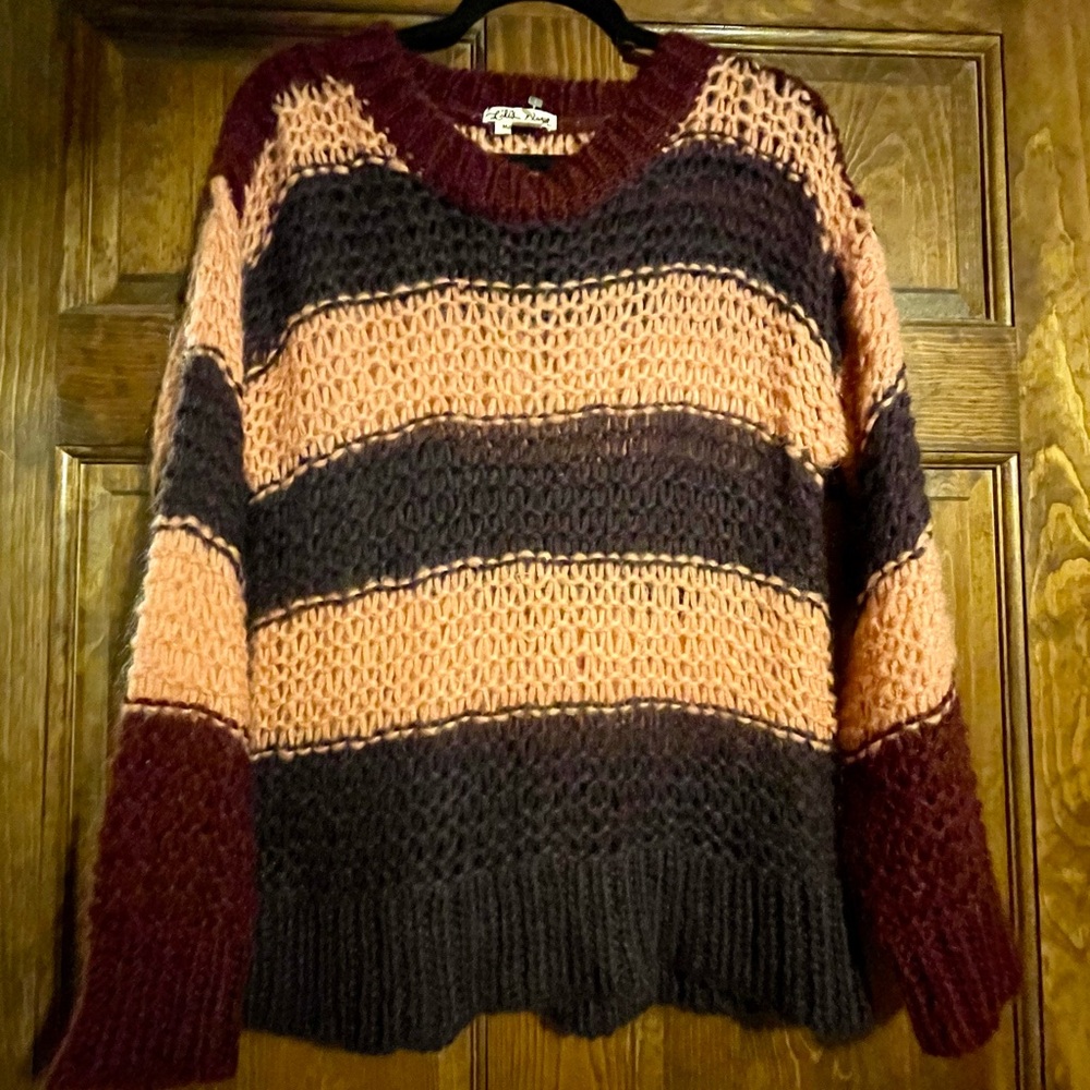 Knit sweater sold by Anthropology from Lili’s Closet, M.